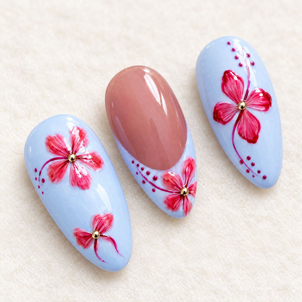 Pastel Blue Floral Almond Press On Nails nail art close-up