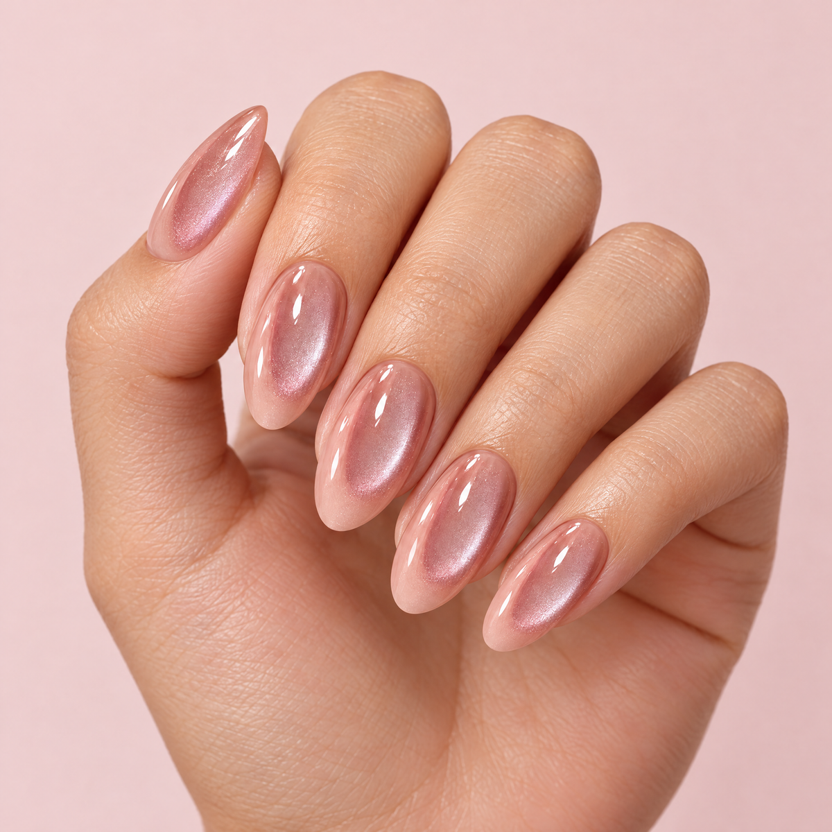 Rosy Nude Cat Eye Press On Nails worn on a hand