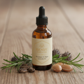 Hair Growth Oil in amber dropper bottle with rosemary and castor beans